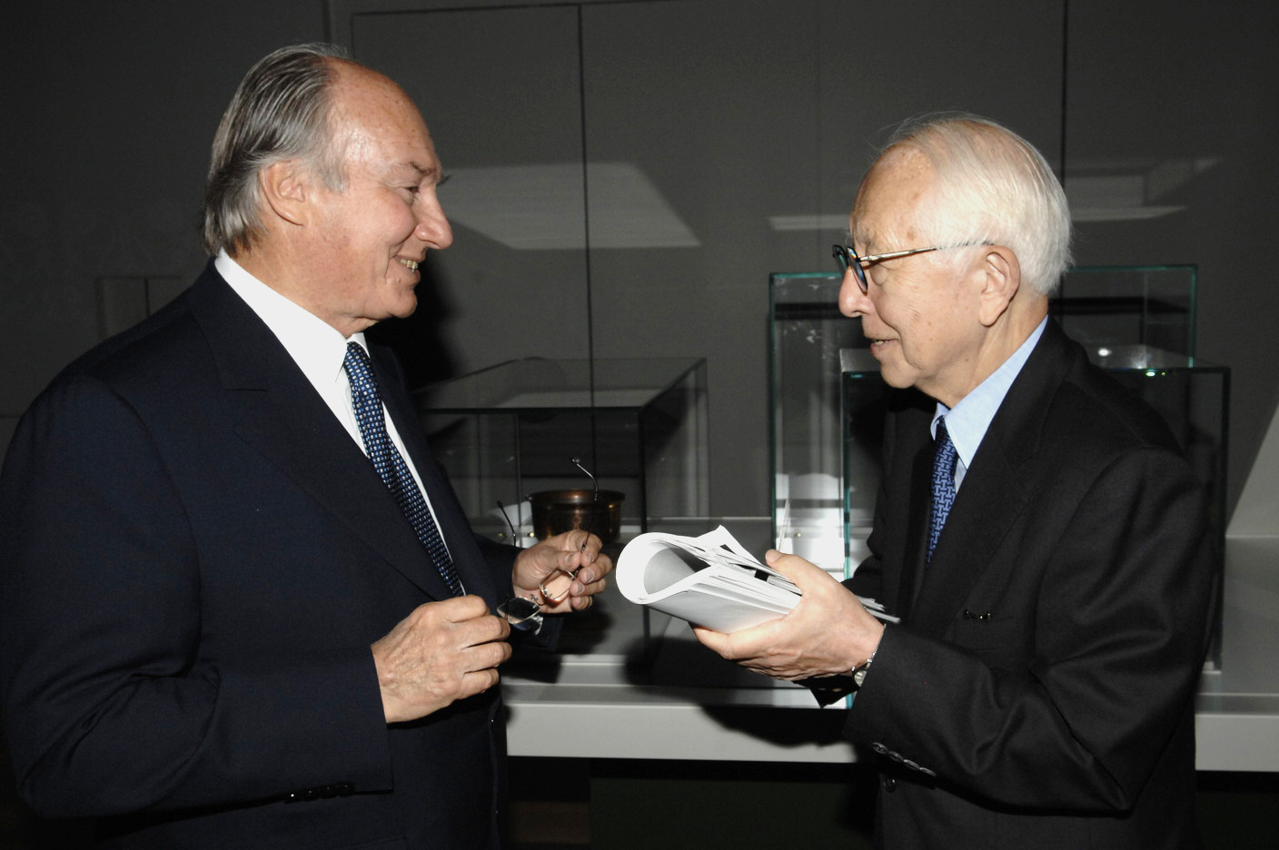 Mawlana Hazar Imam with architect Fumihiko Maki at an Aga Khan Museum Exhibition held at the Louvre in 2007. The renowned Japanese architect has served twice on the Master Jury of the Aga Khan Award for Architecture, and designed both the Aga Khan Museum in Toronto and the Delegation of the Ismaili Imamat in Ottawa. Photo: AKDN / Gary Otte