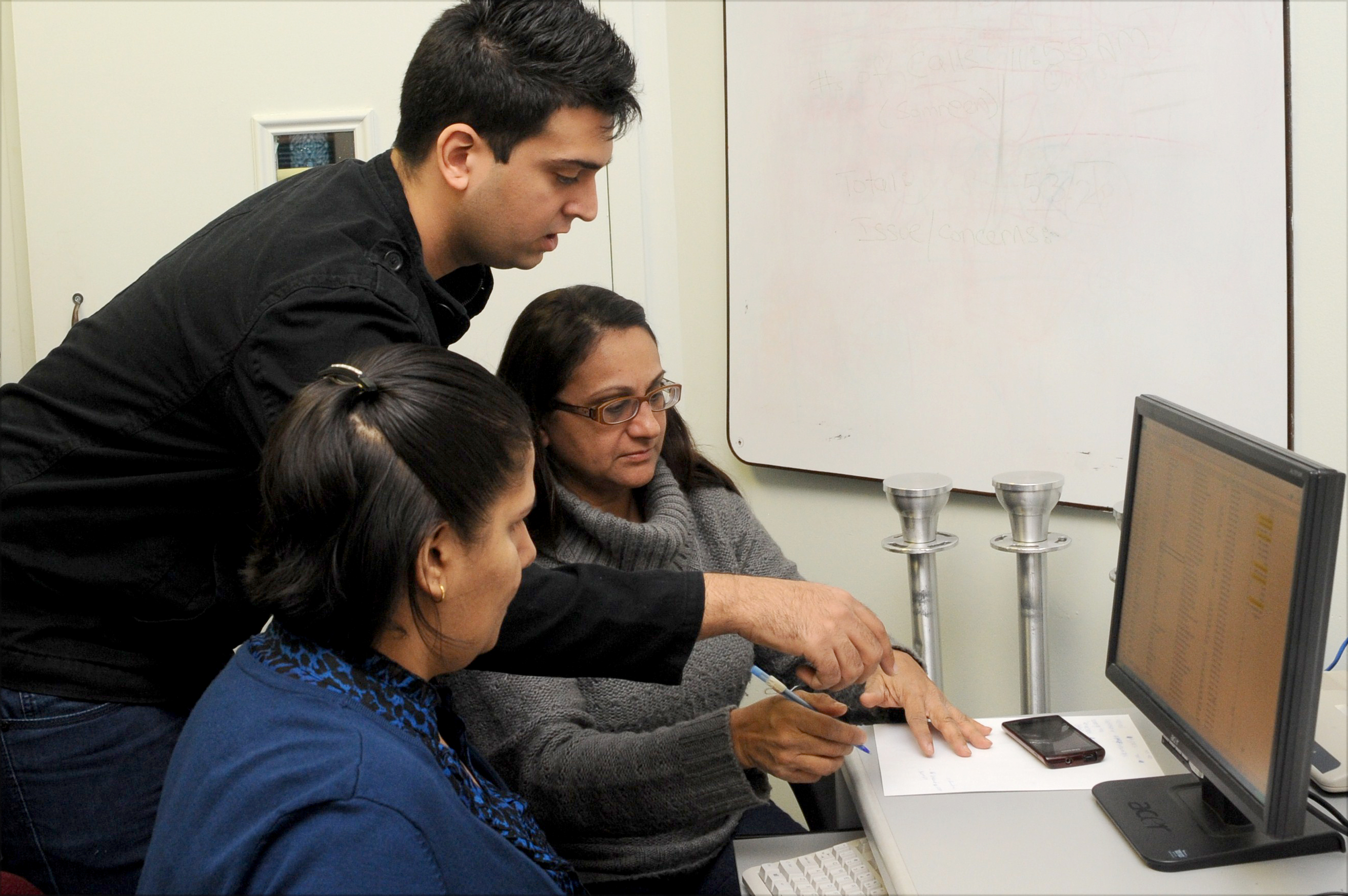 Call centre volunteers at Don Mills Jamatkhana worked with Jamati emergency response teams to assist those in need. Photo: Courtesy of the Ismaili Council for Canada