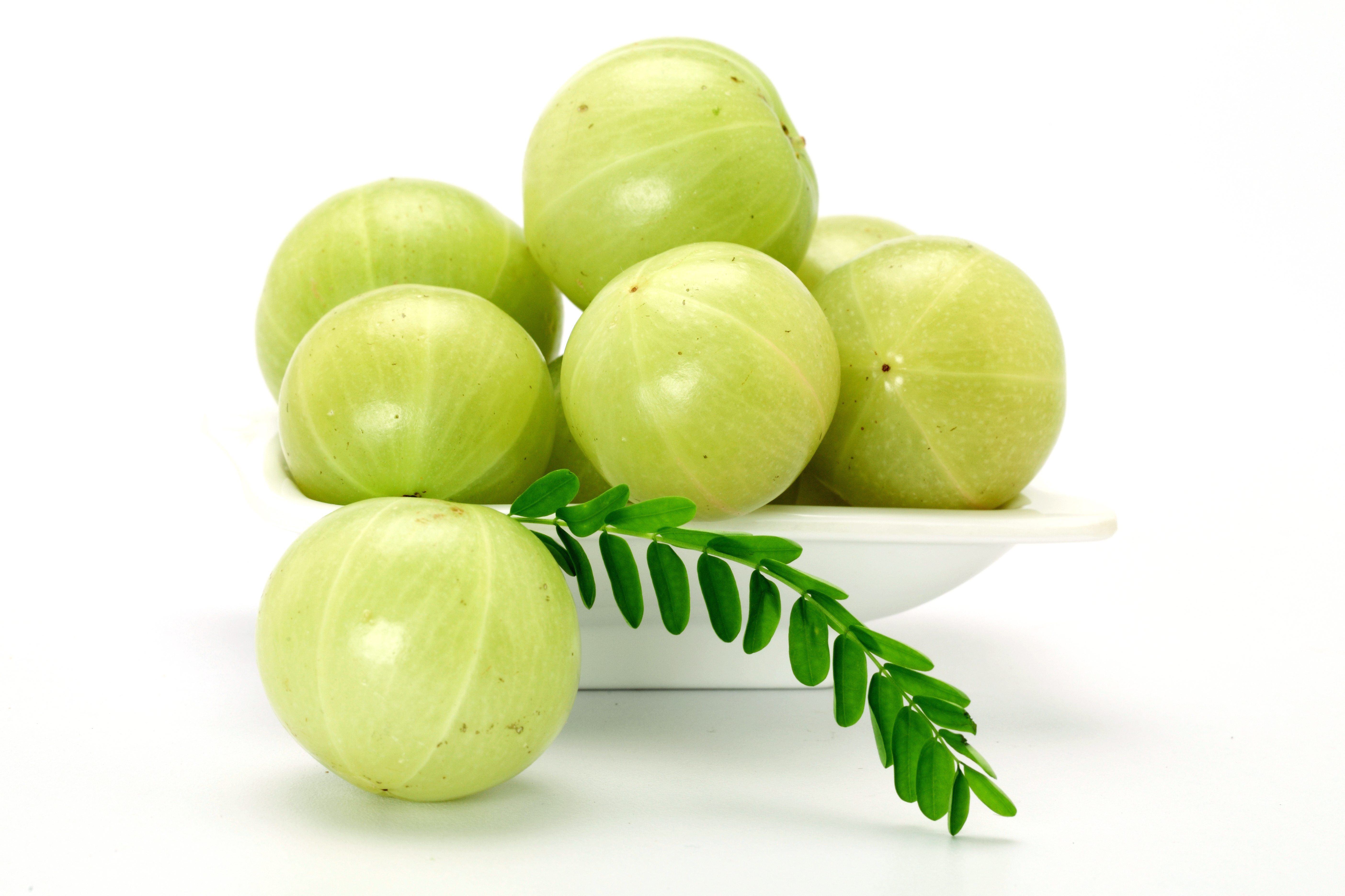 Amla (Indian gooseberry) is a tangy seasonal fruit that is high in vitamin C. Photo: Swapan / Dollar Photo Club