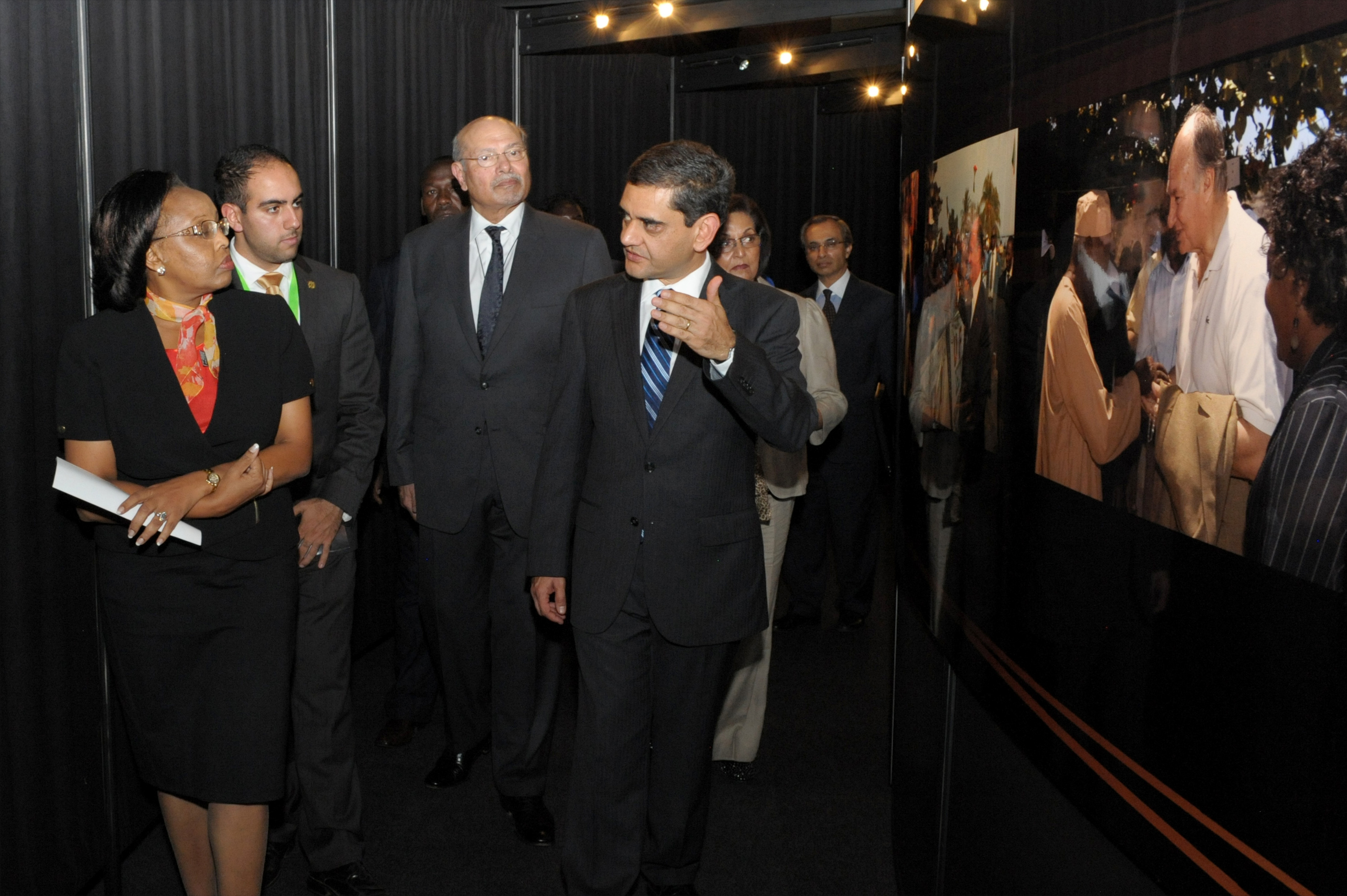 Cabinet Secretary Phyllis Kandie and Ismaili Council for Kenya President Nawaaz Gulam tour the RAYS OF LIGHT exhibition in Nairobi, accompanied by senior Jamati and AKDN leaders. Photo: TheIsmaili / Aly Z. Ramji