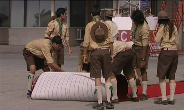 Scouts from Group 36 help set up for Mawlana Hazar Imam`s Golden Jubilee visit to Mozambique. Photo: Ismaili Council for Portugal.