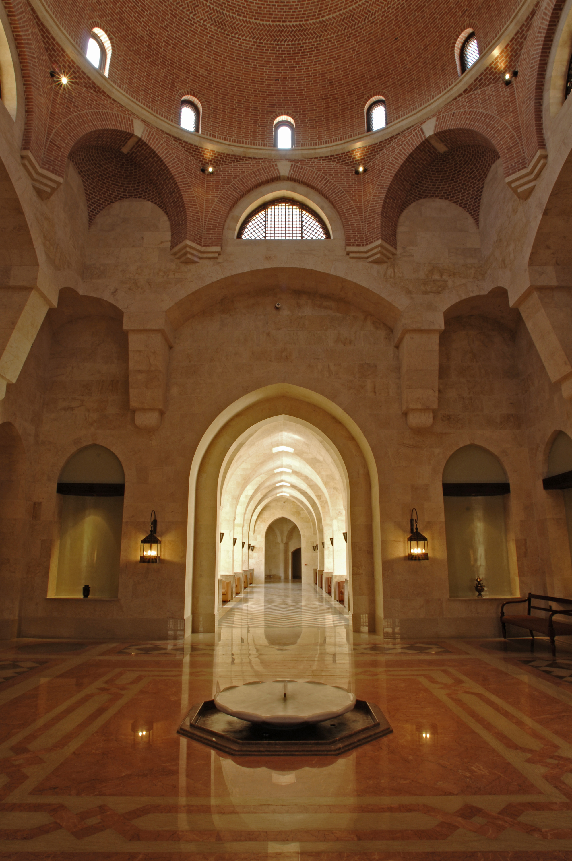 The main entrance hall of the Ismaili Centre Dubai draws architectural inspiration from Fatimid mosques. At the centre of the  colourfully patterned marble floor is an ornamental fountain crafted from a solid block of Carrara marble. Photo: Gary Otte